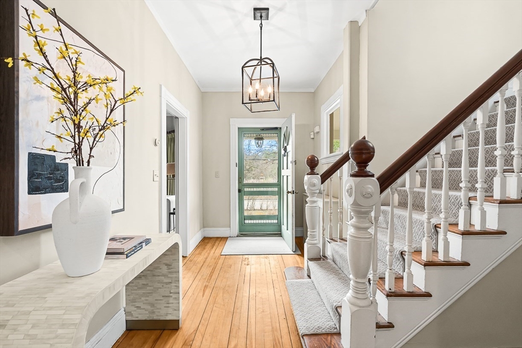 207 Weston Road Wellesley, MA 02482 - Photo 3 of 23 a view of an entryway with wooden floor