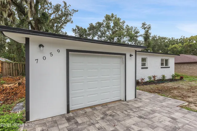 a view of a back yard of the house