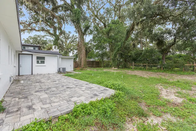 a view of a backyard with a garden