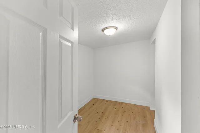 a view of a room with a window