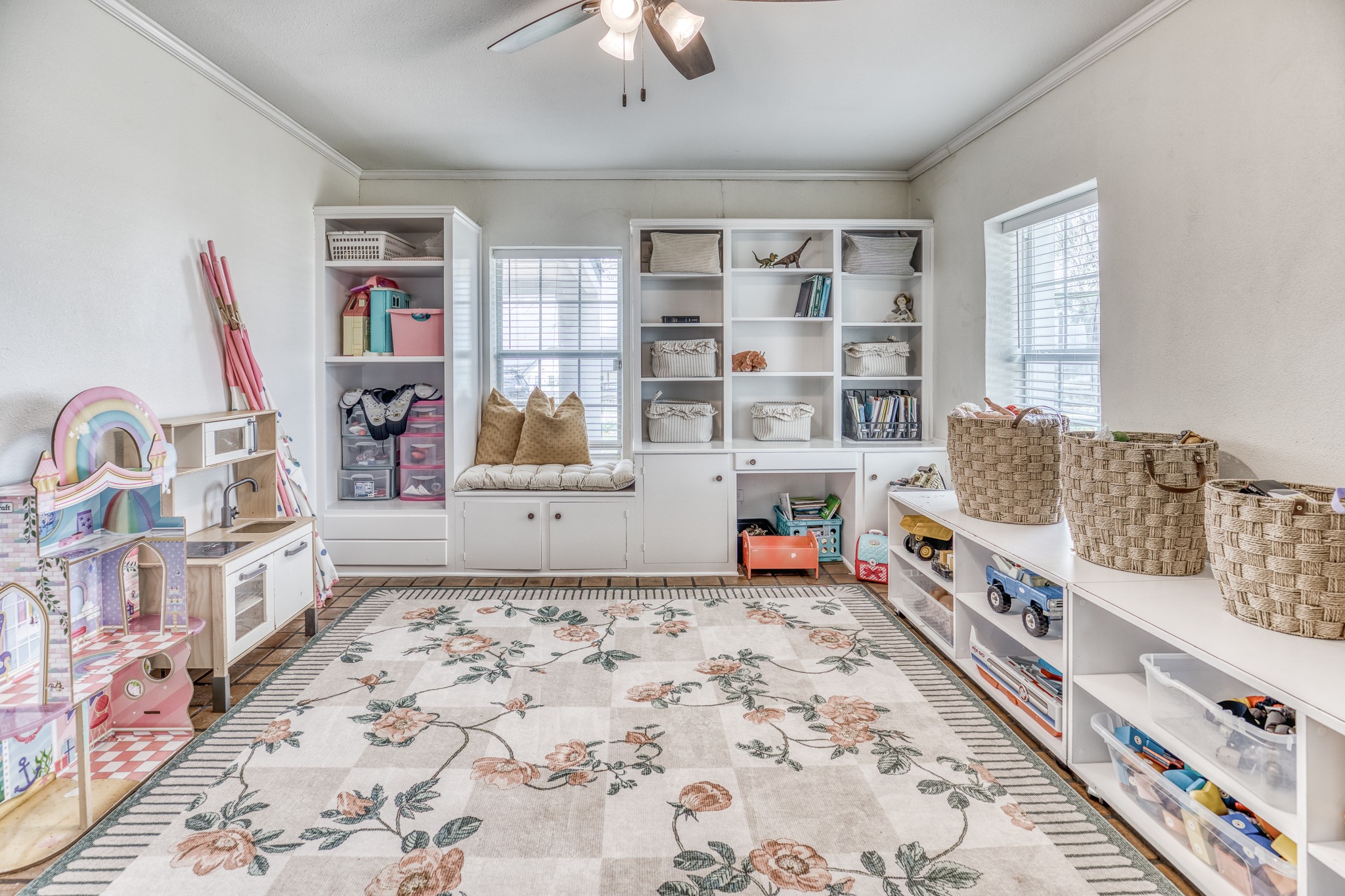 1289 Bluebonnet Ridge Drive Chappell Hill, TX 77426 - Photo 11 of 44 a bedroom with furniture and a book shelf