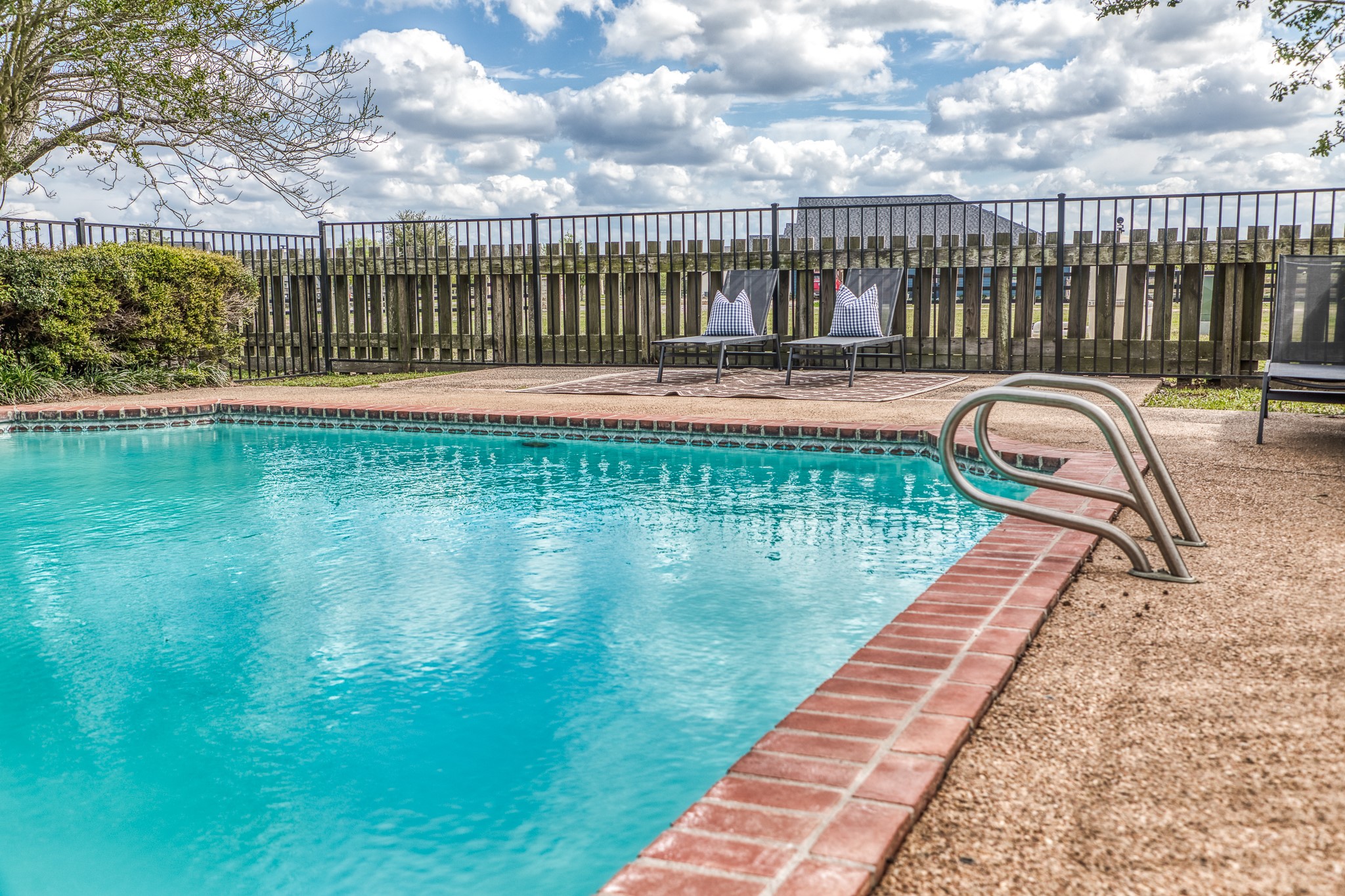 1289 Bluebonnet Ridge Drive Chappell Hill, TX 77426 - Photo 20 of 44 a view of swimming pool with a garden