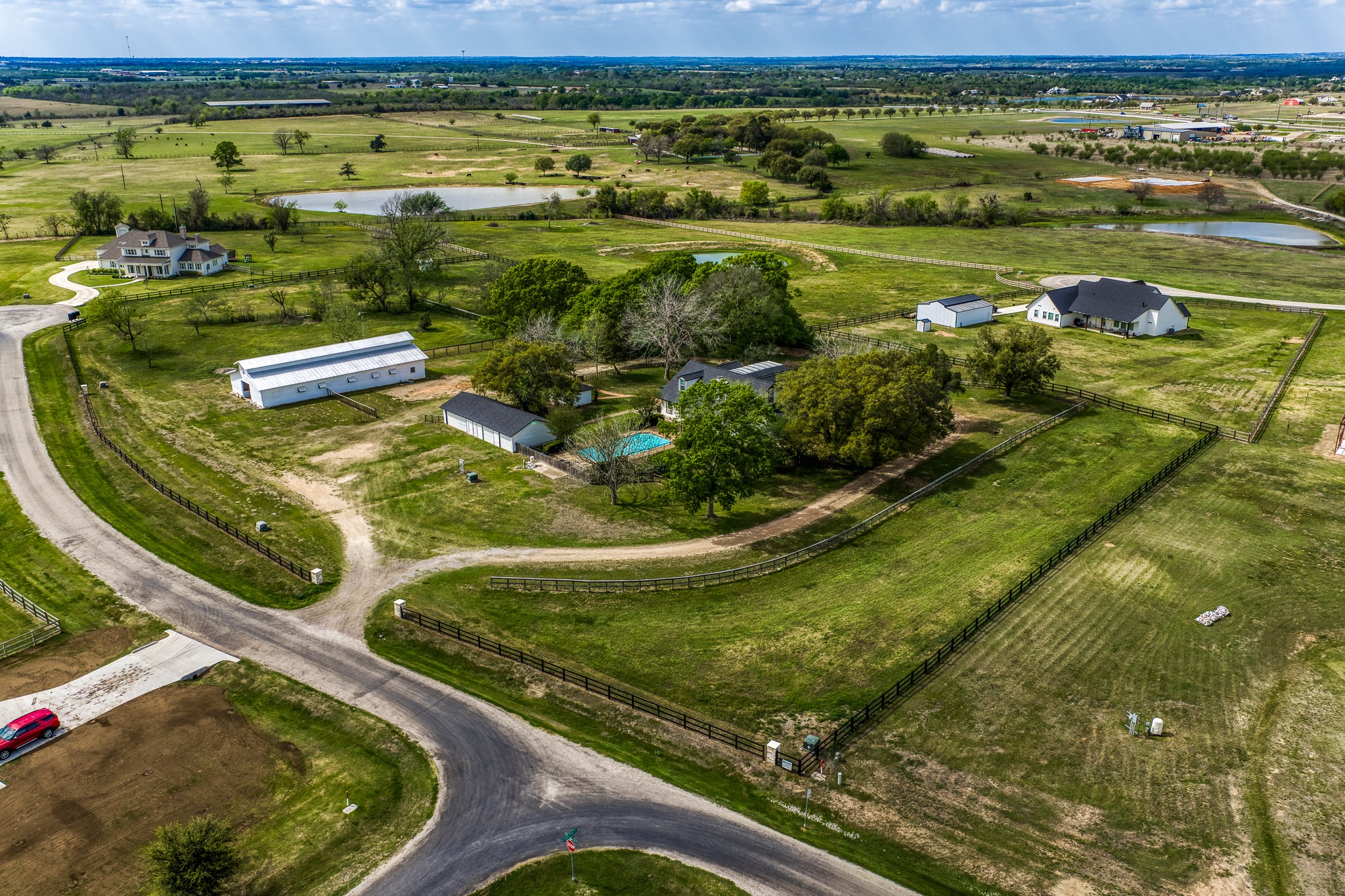 1289 Bluebonnet Ridge Drive Chappell Hill, TX 77426 - Photo 36 of 44 a view of a swimming pool with a yard