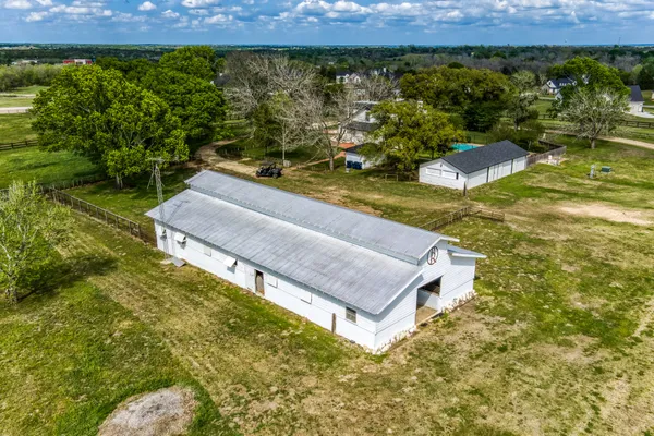 a view of a back yard with an outdoor space