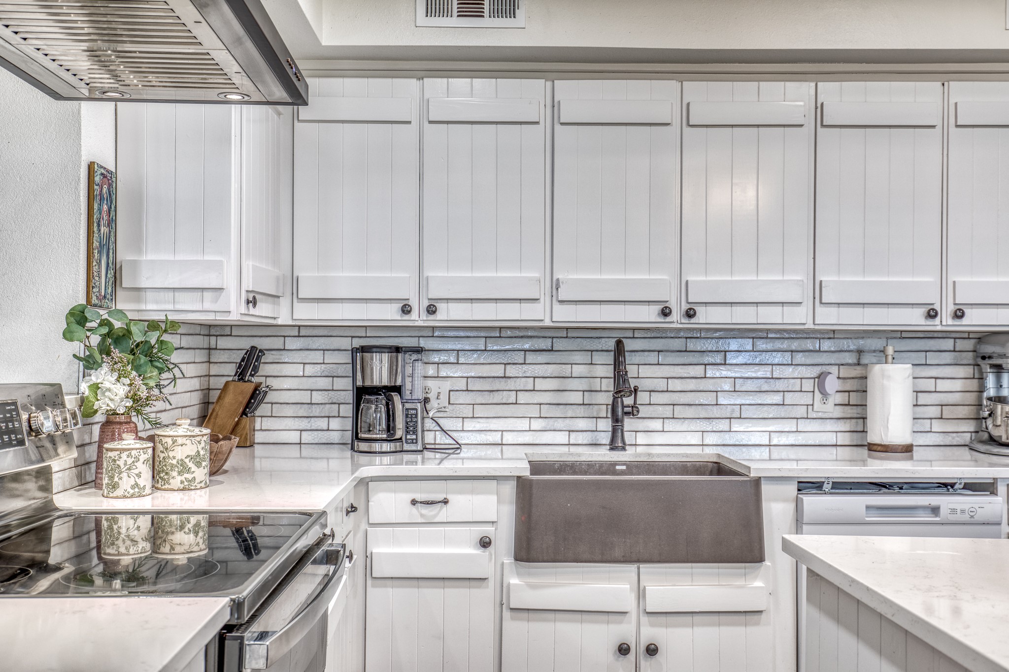 1289 Bluebonnet Ridge Drive Chappell Hill, TX 77426 - Photo 5 of 44 a kitchen with stainless steel appliances cabinets and a counter top