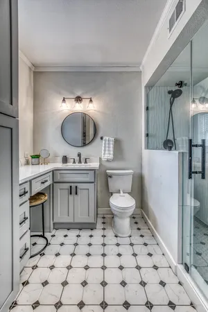 a bedroom with furniture and a book shelf