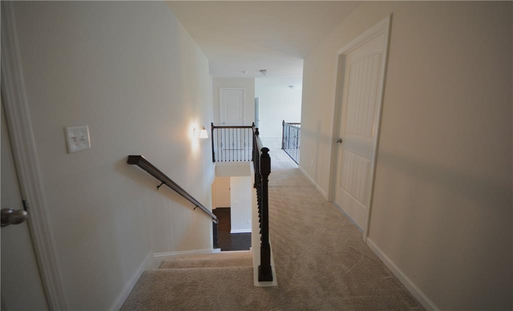 2467 Overlook Avenue Lithonia, GA 30058 - Photo 33 of 51 a view of a hallway with staircase