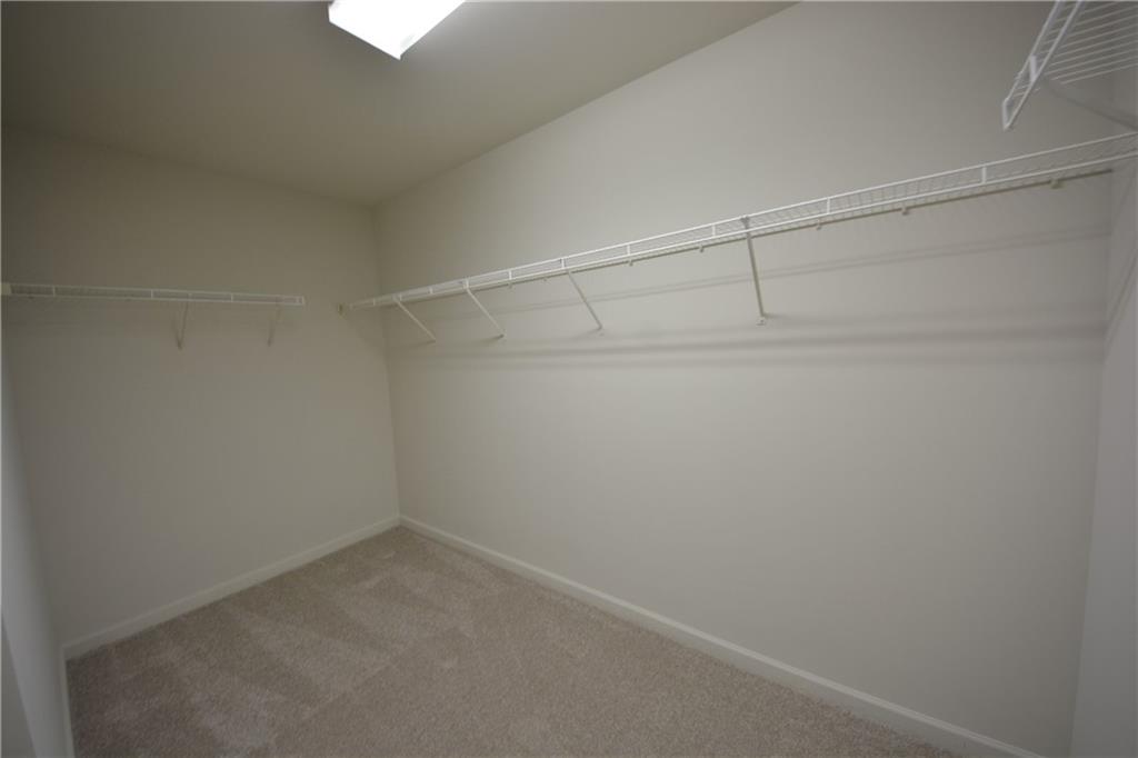 2467 Overlook Avenue Lithonia, GA 30058 - Photo 39 of 51 a view of a room with racks on the wall