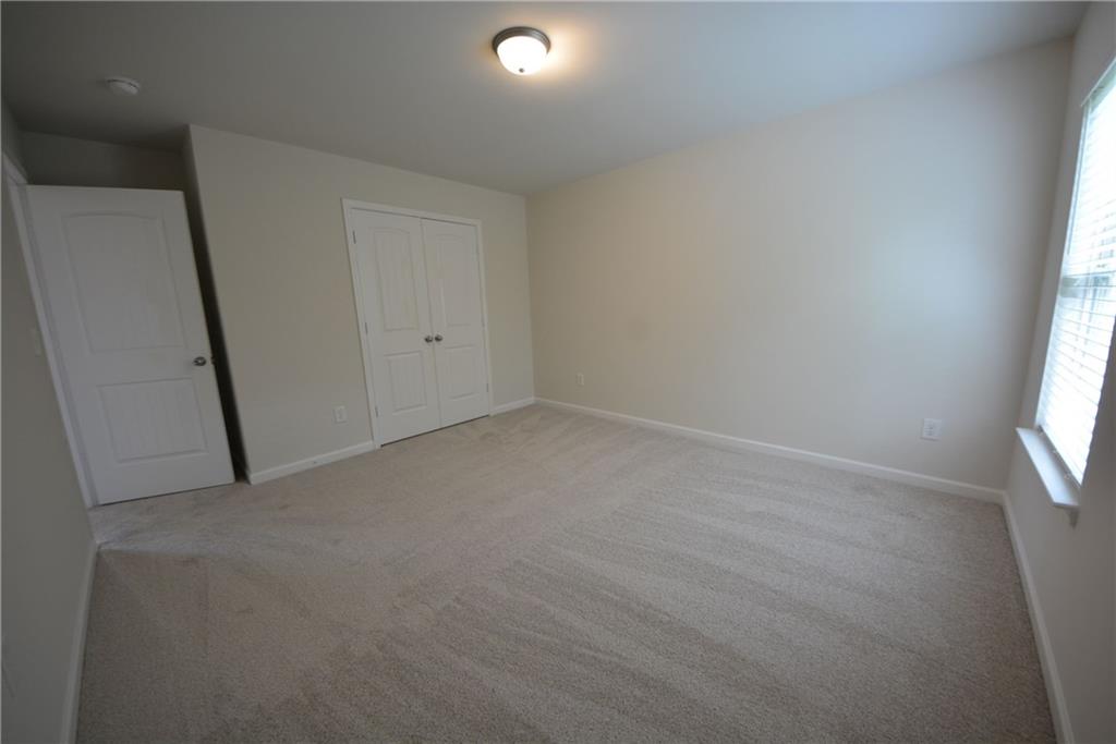 2467 Overlook Avenue Lithonia, GA 30058 - Photo 47 of 51 an empty room with windows