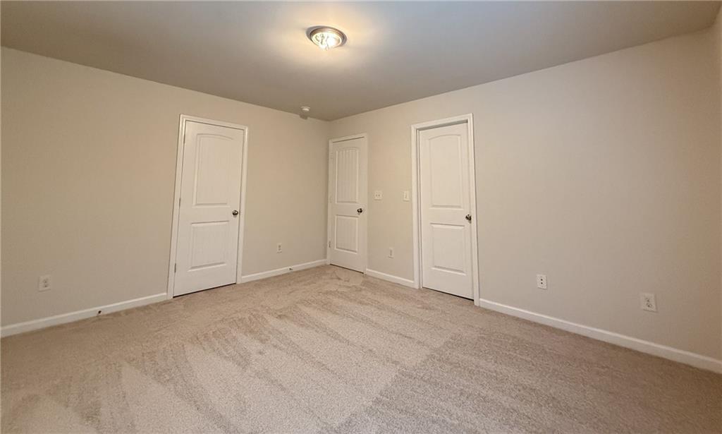 2467 Overlook Avenue Lithonia, GA 30058 - Photo 50 of 51 an empty room with an entryway