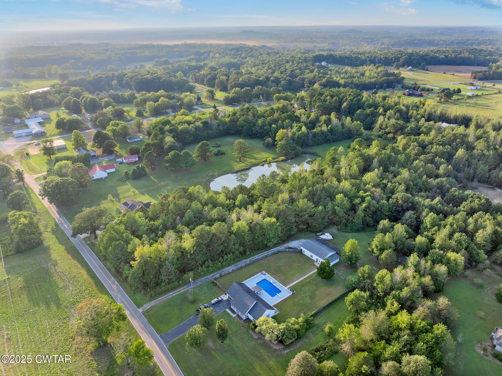 0 Sand Ridge Road Huron, TN 38345 - Photo 7 of 11 an aerial view of a house with a lake view