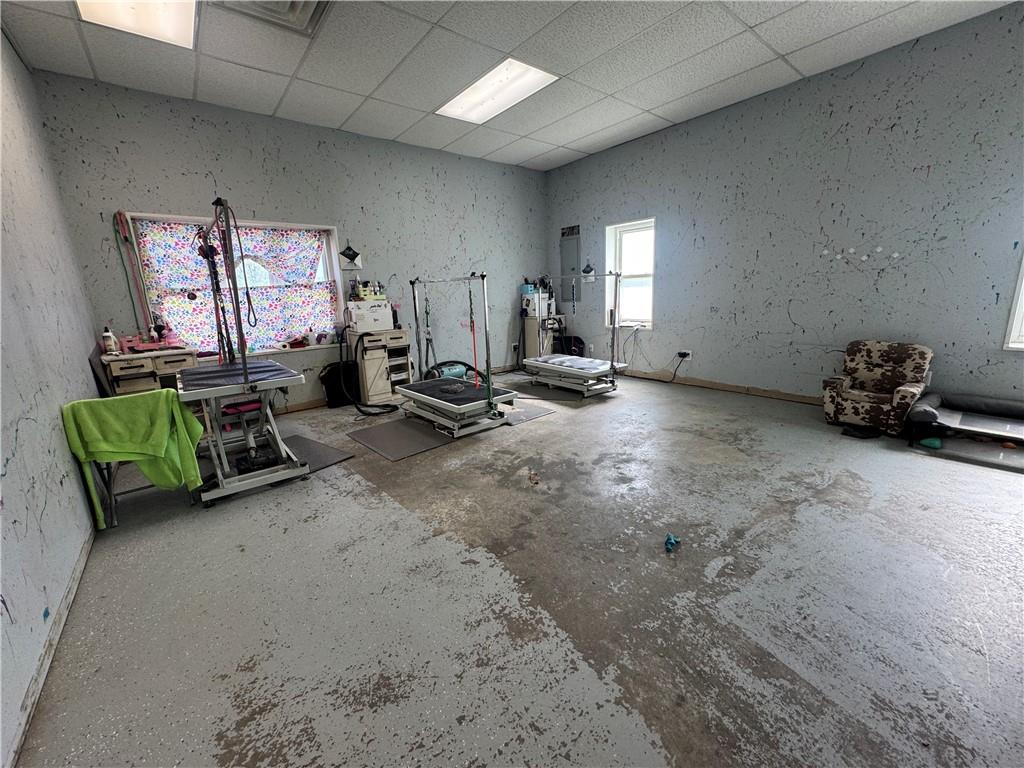 148 Big Knob Road Rochester, PA 15074 - Photo 11 of 16 a room with gym equipment and a view of living room