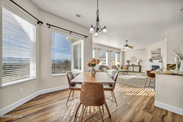 a balcony with furniture and city view