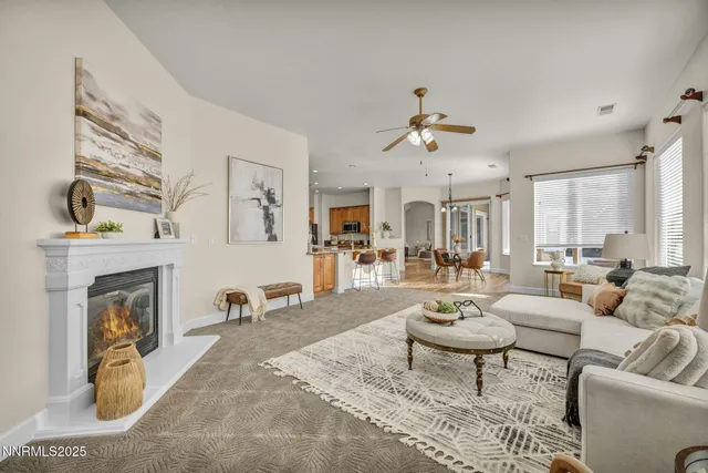 a bed room with furniture and a fireplace