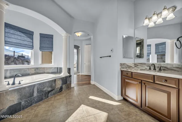a view of a kitchen with wooden floor and a kitchen