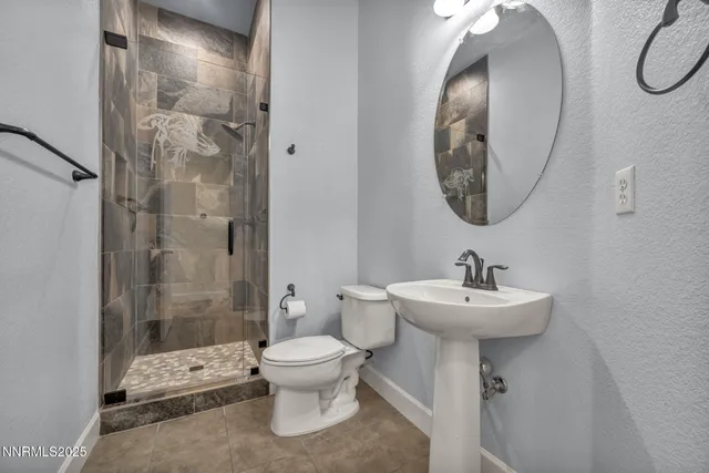 a utility room with sink dryer and washer