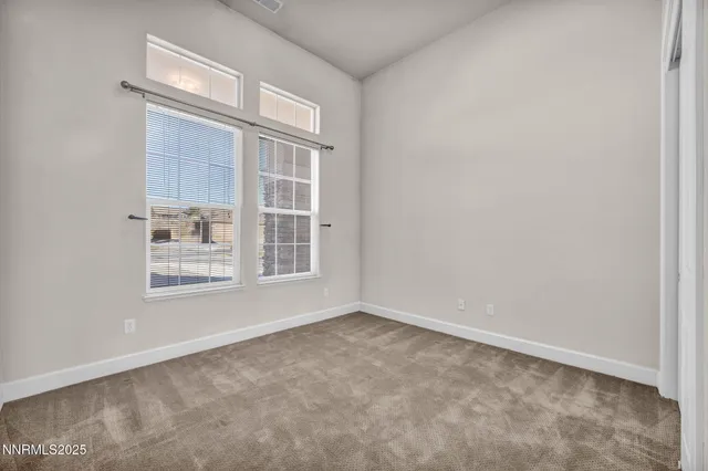 a view of a wooden house with a outdoor space