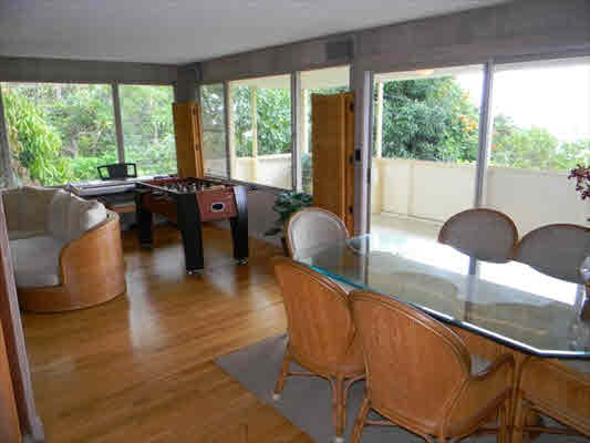 811022 A Captain Cook Road Captain Cook, HI 96704 - Photo 6 of 16 a living room with furniture and a large window