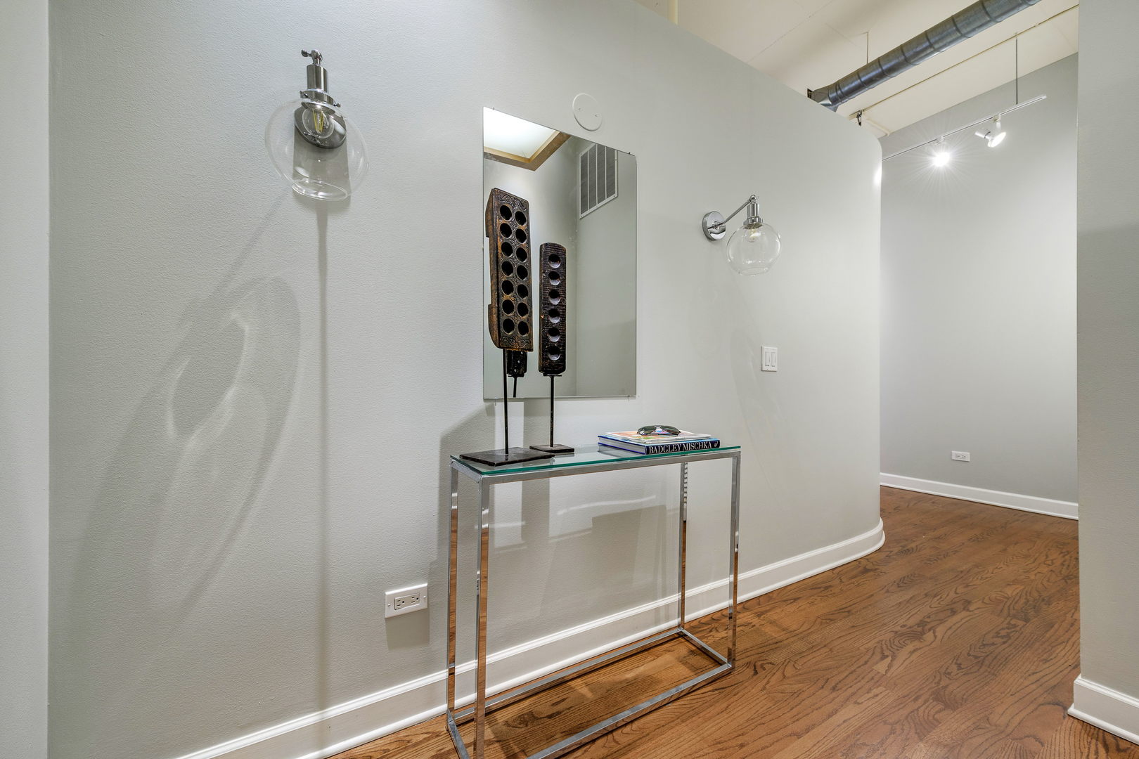 1301 West Madison Street, Unit 520 Chicago, IL 60607 - Photo 2 of 17 a view of a livingroom with wooden floor