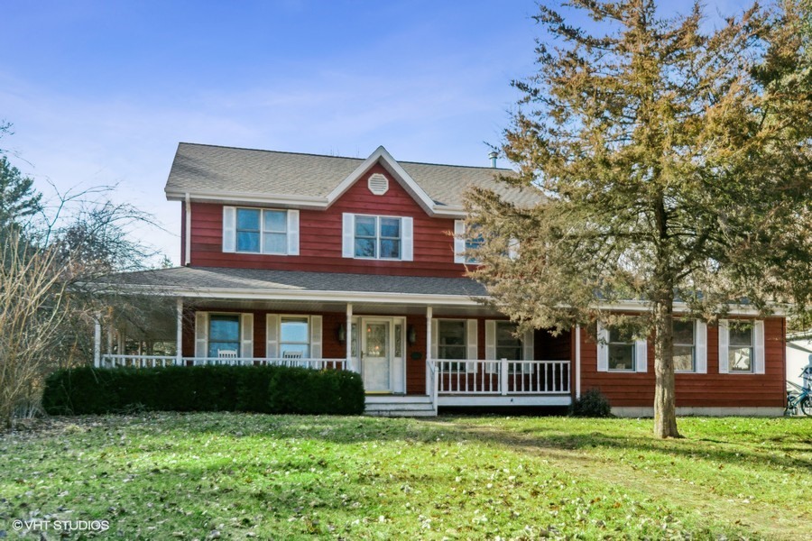 3654 North 12000 W Road Bonfield, IL 60913 - Photo 1 of 19 a front view of a house with a garden
