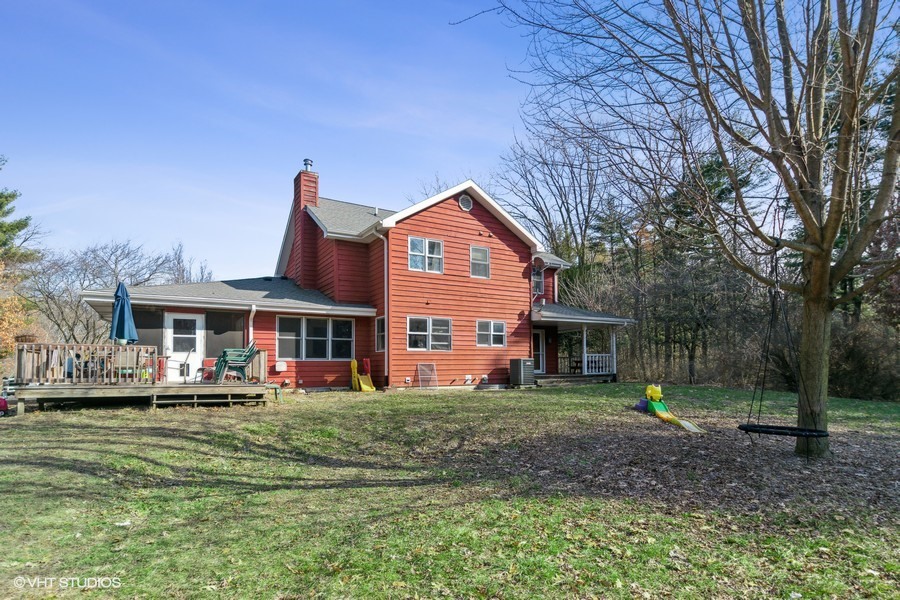 3654 North 12000 W Road Bonfield, IL 60913 - Photo 3 of 19 a front view of a house with a yard