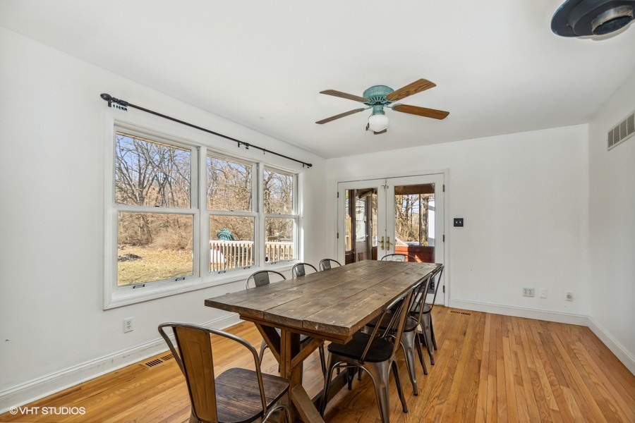 3654 North 12000 W Road Bonfield, IL 60913 - Photo 7 of 19 a view of a dining room with furniture window and outside view