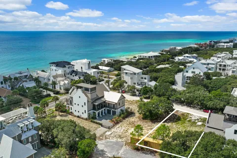 an aerial view of a house with a garden