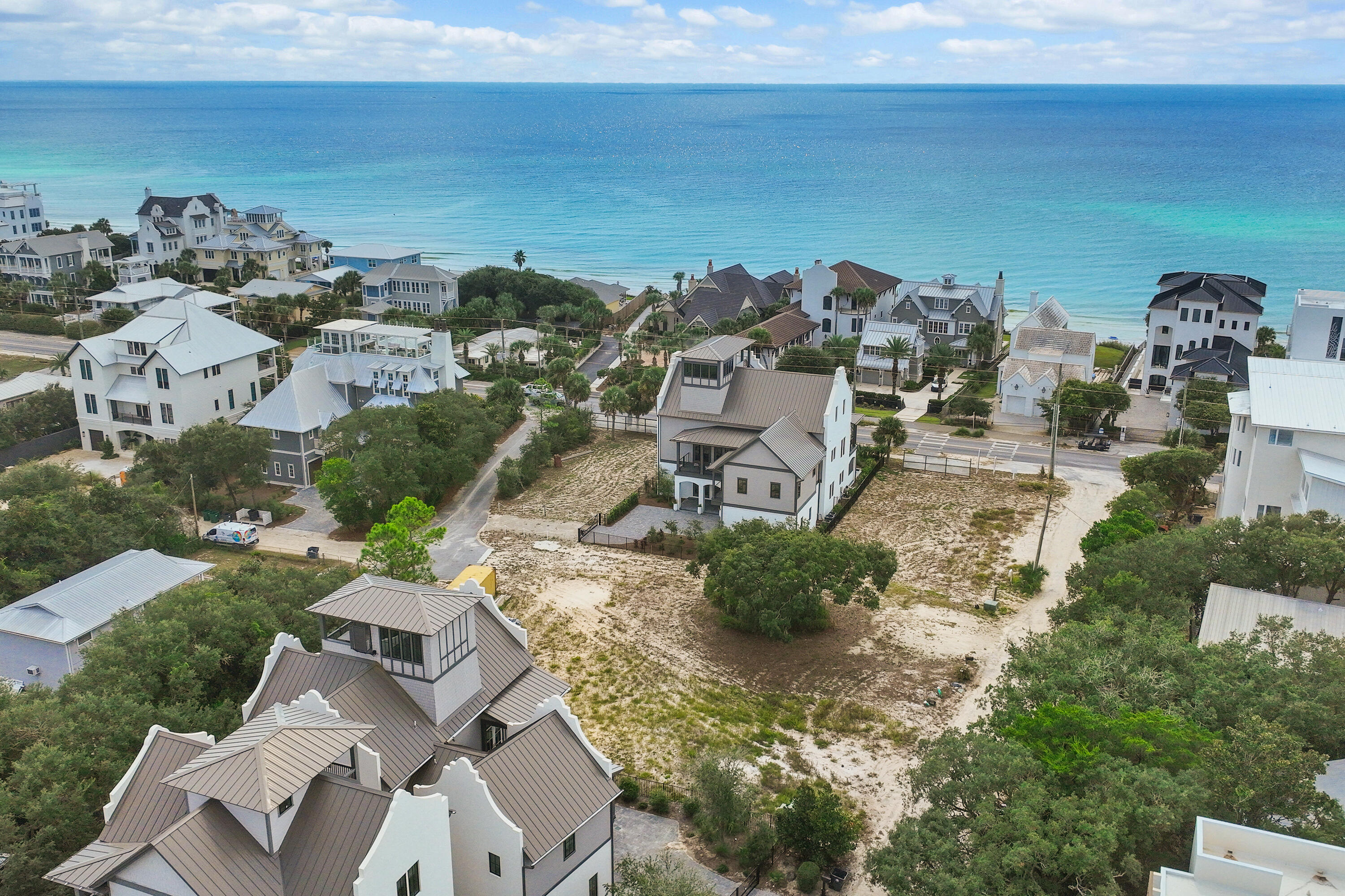 40 Gardenia Street Santa Rosa Beach, FL 32459 - Photo 8 of 9 an aerial view of a house with lots of residential buildings ocean and mountain view in back