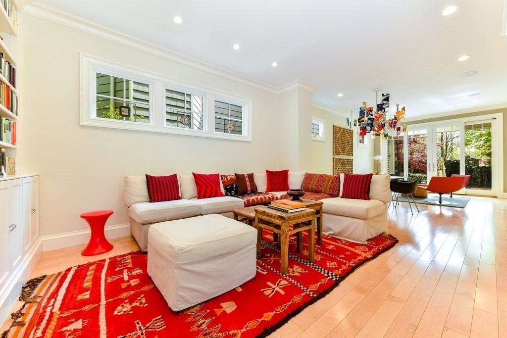 265 Upland Road Cambridge, MA 02140 - Photo 13 of 39 a living room with furniture and a chandelier