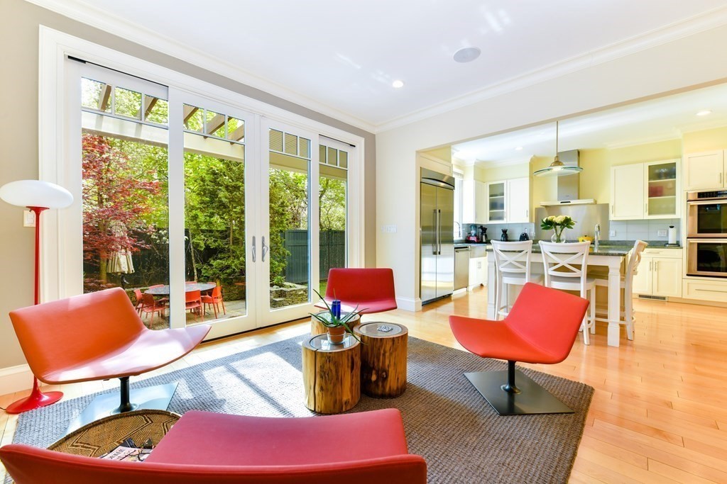 265 Upland Road Cambridge, MA 02140 - Photo 14 of 39 a living room with furniture and floor to ceiling windows