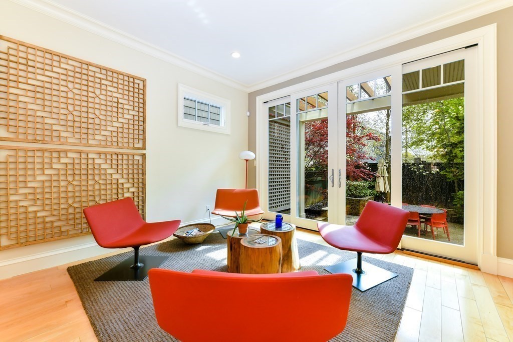 265 Upland Road Cambridge, MA 02140 - Photo 15 of 39 a living room with furniture and floor to ceiling window