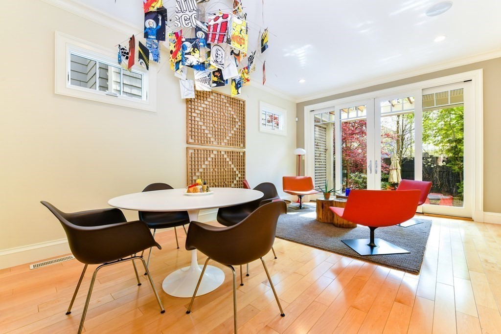 265 Upland Road Cambridge, MA 02140 - Photo 16 of 39 a living room with furniture and floor to ceiling windows