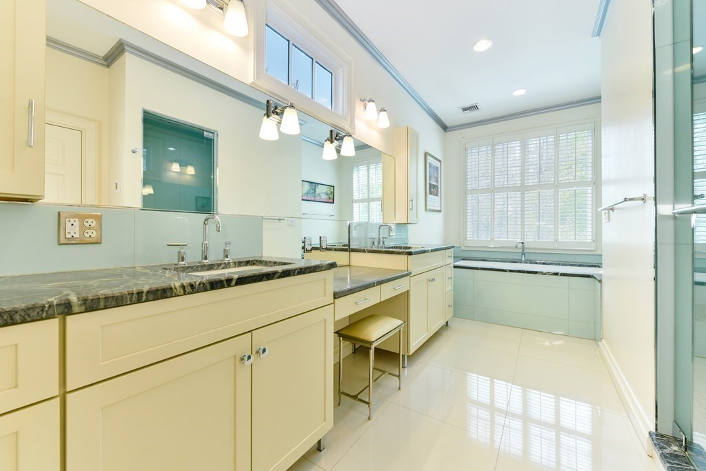 265 Upland Road Cambridge, MA 02140 - Photo 19 of 39 a large white kitchen with a large window