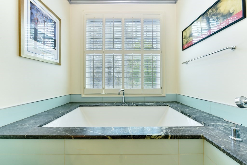265 Upland Road Cambridge, MA 02140 - Photo 20 of 39 a bathroom with bathtub