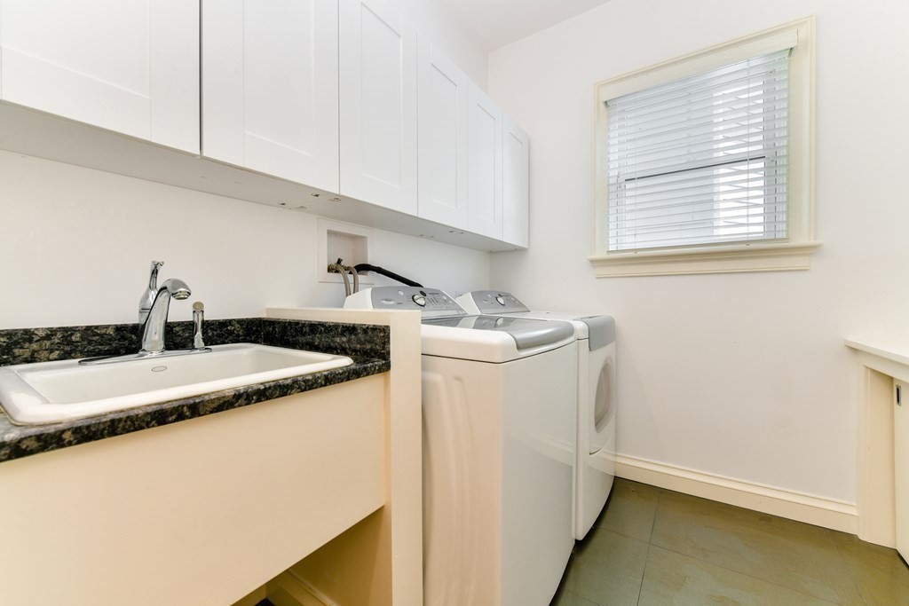 265 Upland Road Cambridge, MA 02140 - Photo 26 of 39 a utility room with dryer and washer
