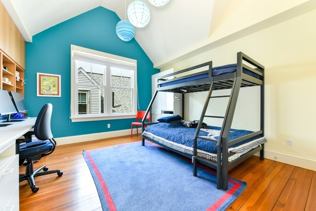265 Upland Road Cambridge, MA 02140 - Photo 29 of 39 a bedroom with bunk bed and a window