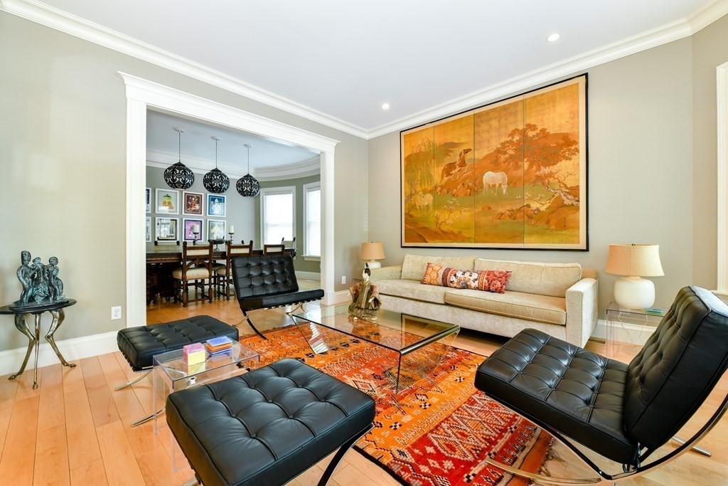 265 Upland Road Cambridge, MA 02140 - Photo 3 of 39 a living room with furniture and a flat screen tv