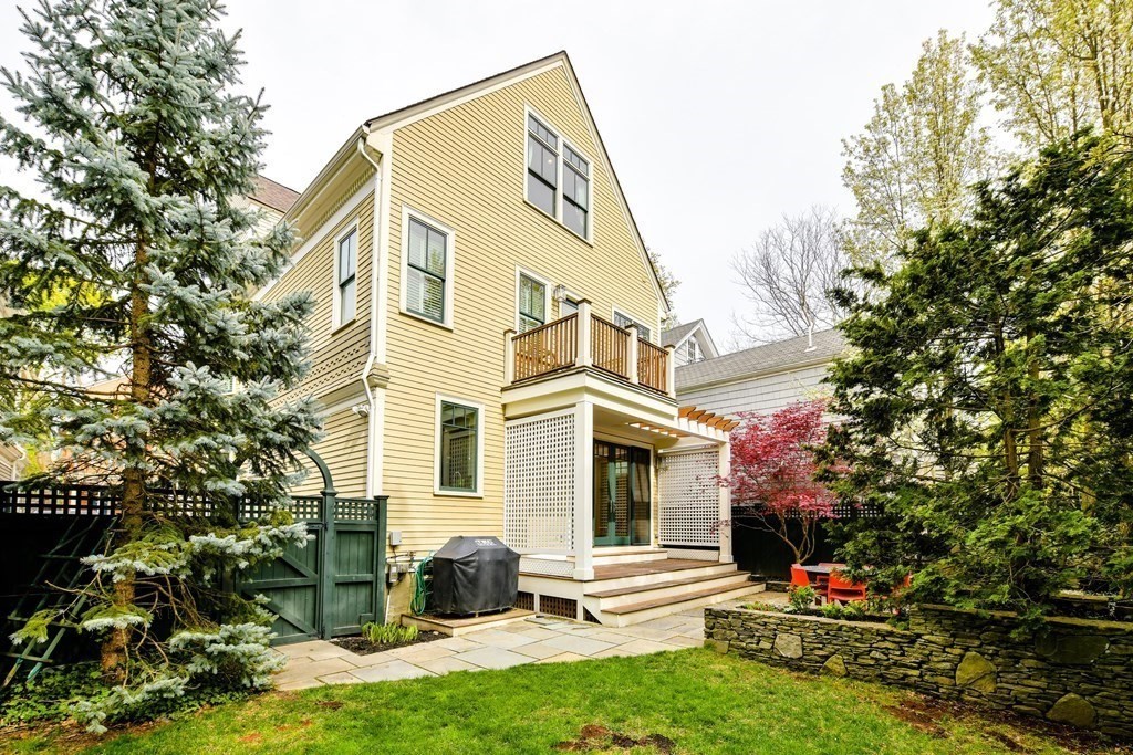 265 Upland Road Cambridge, MA 02140 - Photo 35 of 39 a front view of a house with a yard and trees