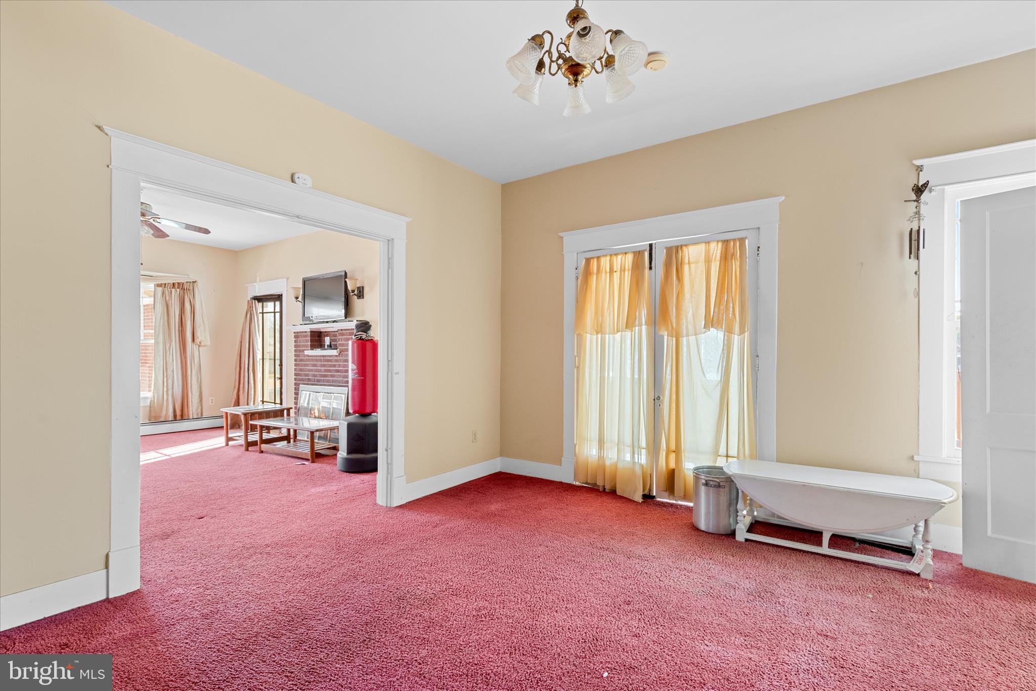 26740 Old State Road Crisfield, MD 21817 - Photo 13 of 49 wooden floor and windows in a room