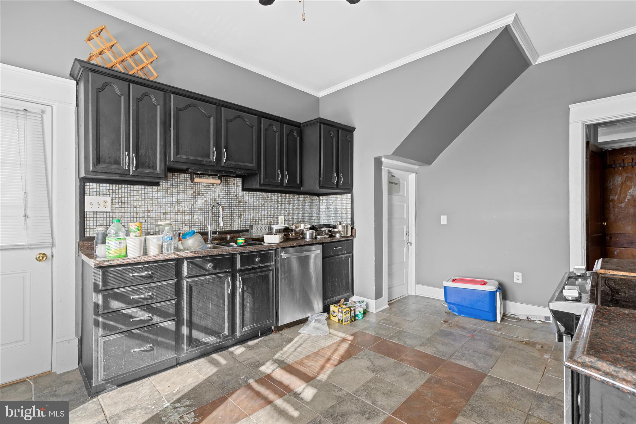 26740 Old State Road Crisfield, MD 21817 - Photo 15 of 49 a kitchen with stainless steel appliances kitchen island granite countertop a refrigerator stove and sink