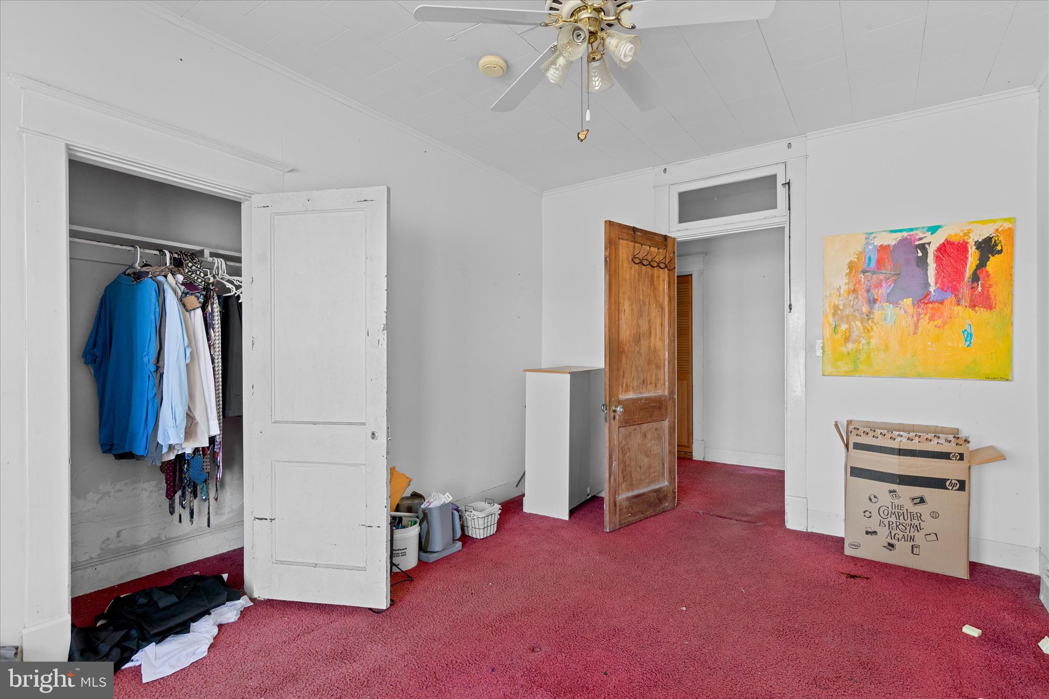 26740 Old State Road Crisfield, MD 21817 - Photo 21 of 49 a view of a livingroom with furniture and a flat screen tv