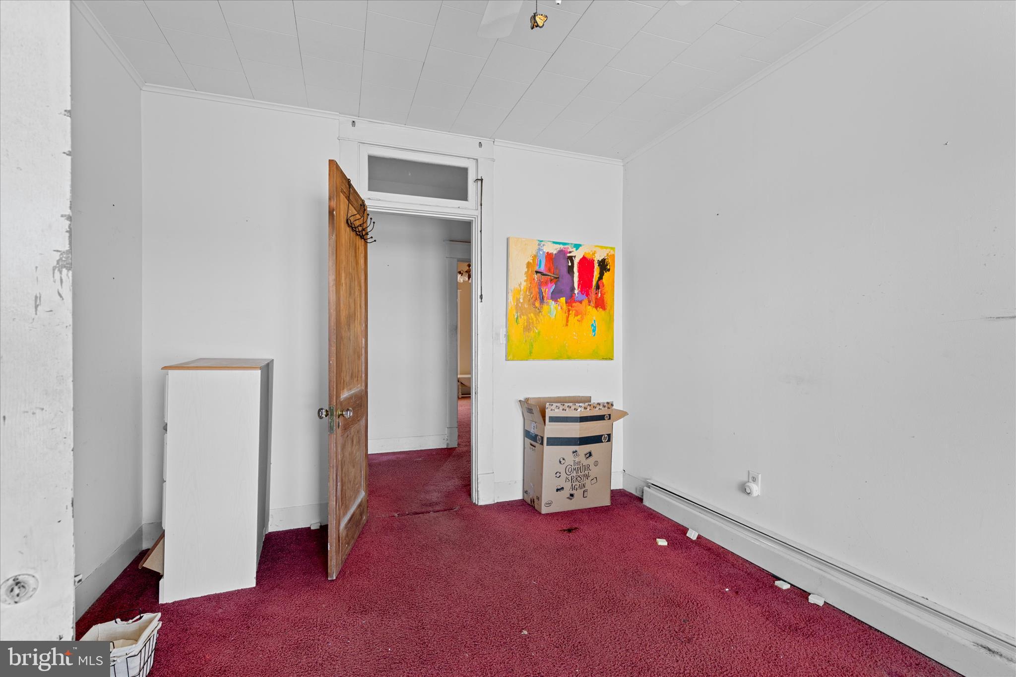 26740 Old State Road Crisfield, MD 21817 - Photo 22 of 49 an empty room with furniture and painting on the wall