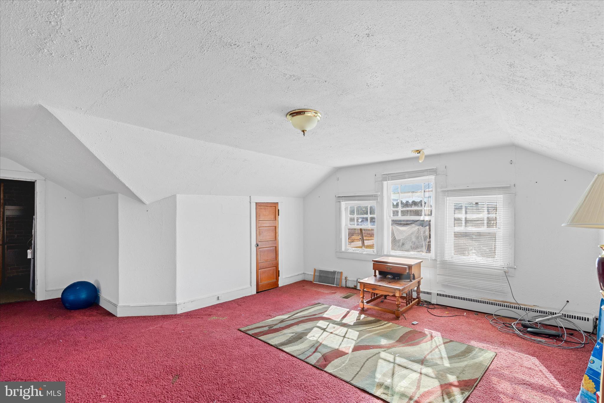 26740 Old State Road Crisfield, MD 21817 - Photo 29 of 49 a living room with furniture rug and window