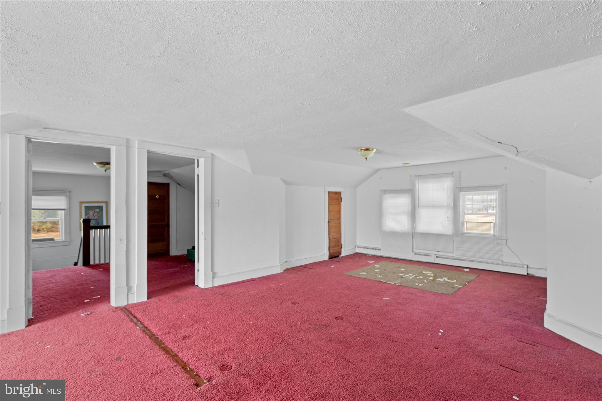 26740 Old State Road Crisfield, MD 21817 - Photo 31 of 49 a bedroom with a bed and a dresser