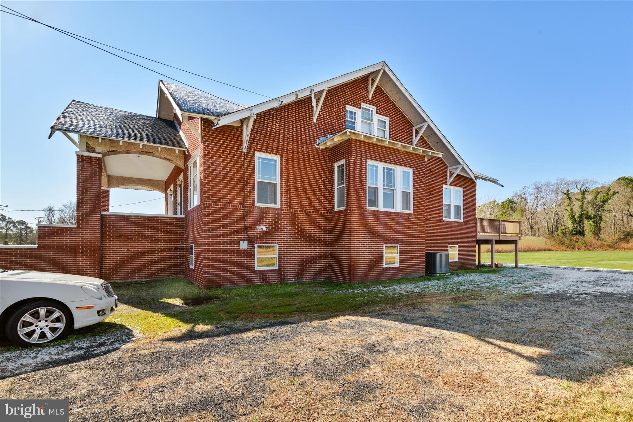 26740 Old State Road Crisfield, MD 21817 - Photo 40 of 49 a front view of a house with garden