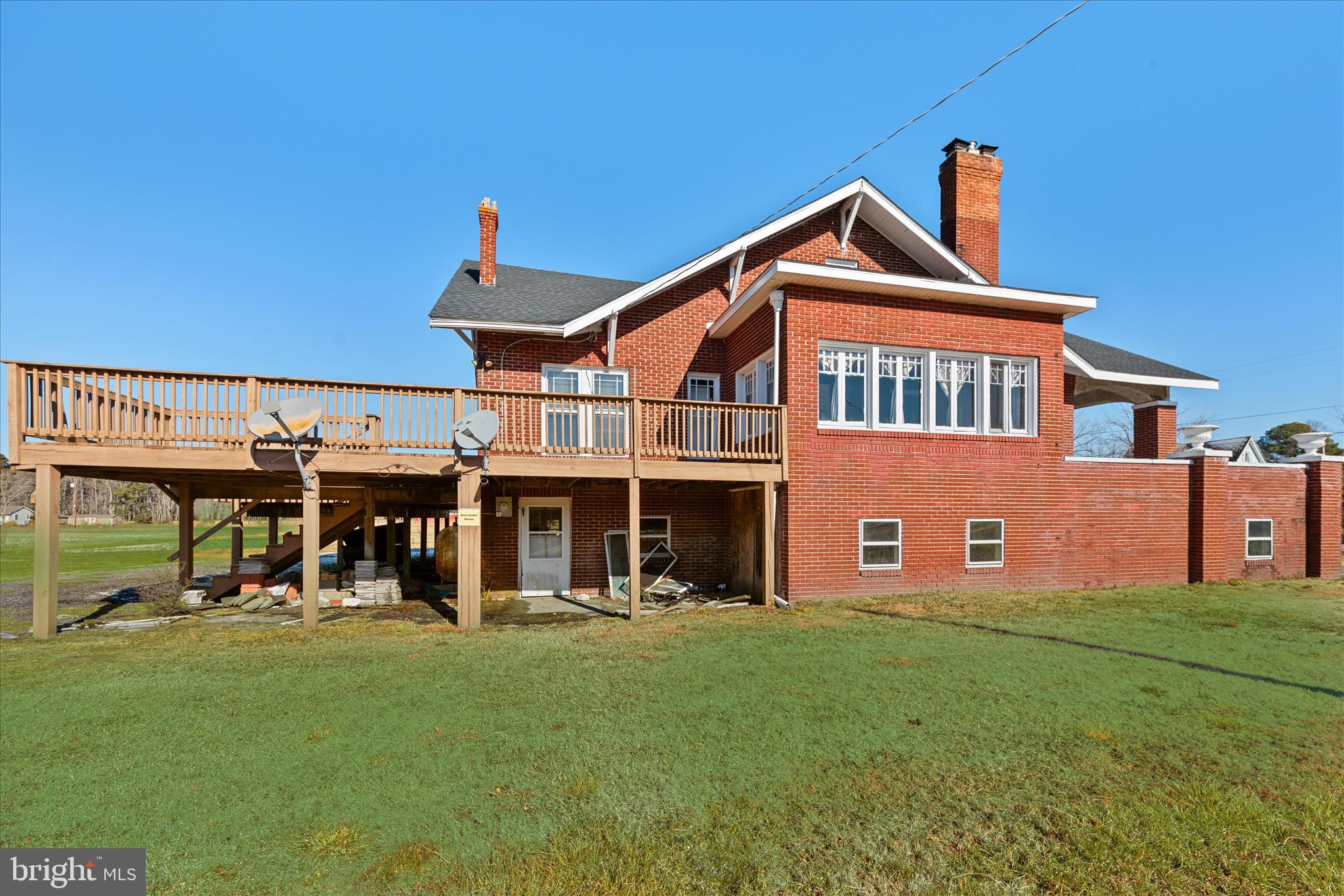 26740 Old State Road Crisfield, MD 21817 - Photo 49 of 49 a front view of a house with a yard