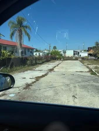 a view of a backyard of a house