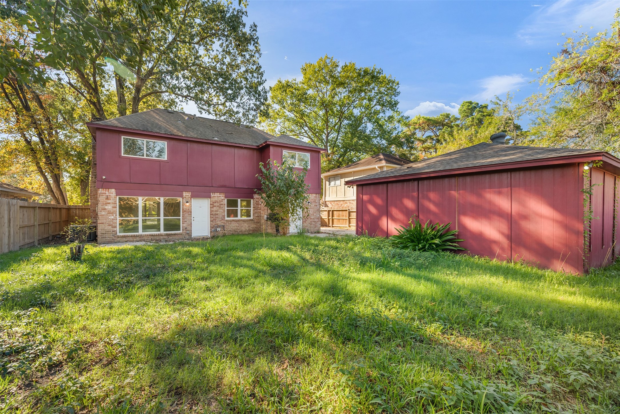 24118 Spring Mill Lane Spring, TX 77373 - Photo 24 of 24 a view of a house with a yard
