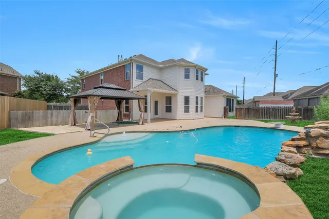 a view of outdoor space yard and front view of a house