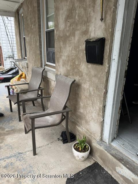 343 Phelps Street Scranton, PA 18509 - Photo 2 of 20 a living room with furniture and a flat screen tv